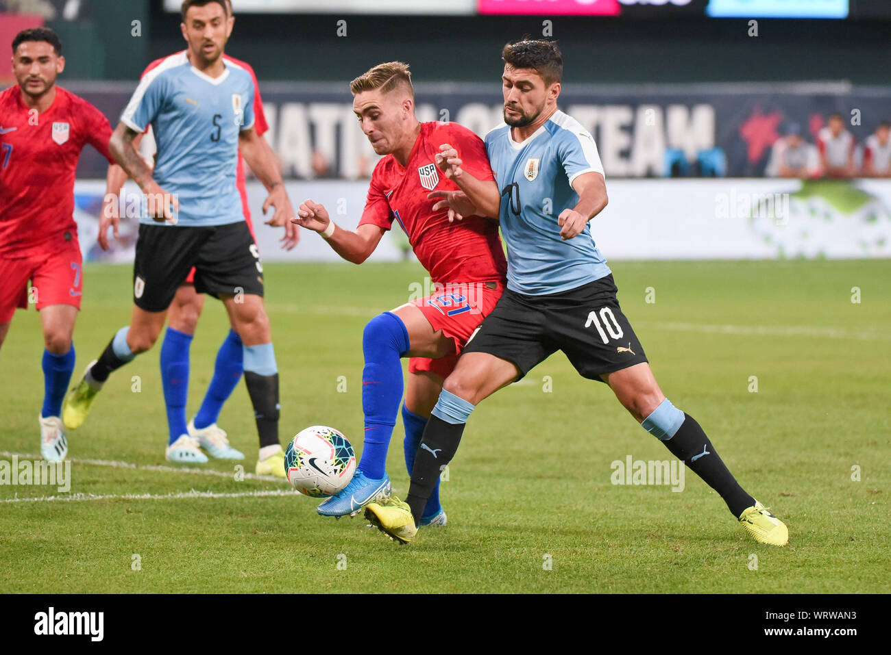 St. Louis, Missouri, USA. 10th Sep, 2019. Uruguay midfielder Giorgian De Arrascaeta (10) bumps US Men's National Team forward Tyler Boyd (21) pushing the ball out of bounds during the final match before the Concacaf Nations League as the United States Men's National Team hosted Uruguay at Busch Stadium in St. Louis City, MO Ulreich/CSM/Alamy Live News Stock Photo