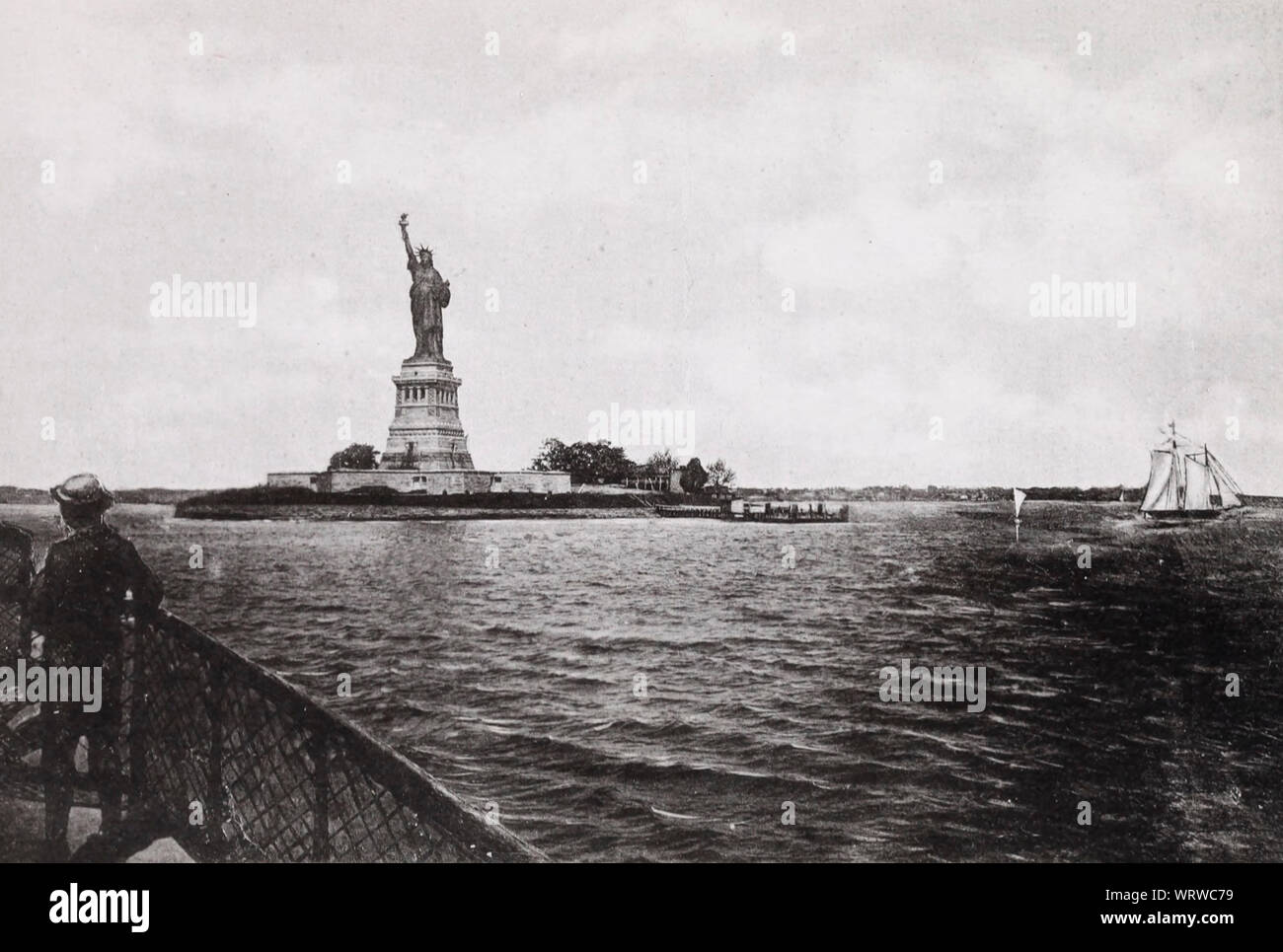 Approaching the Statue of Liberty by boat, circa 1890 Stock Photo