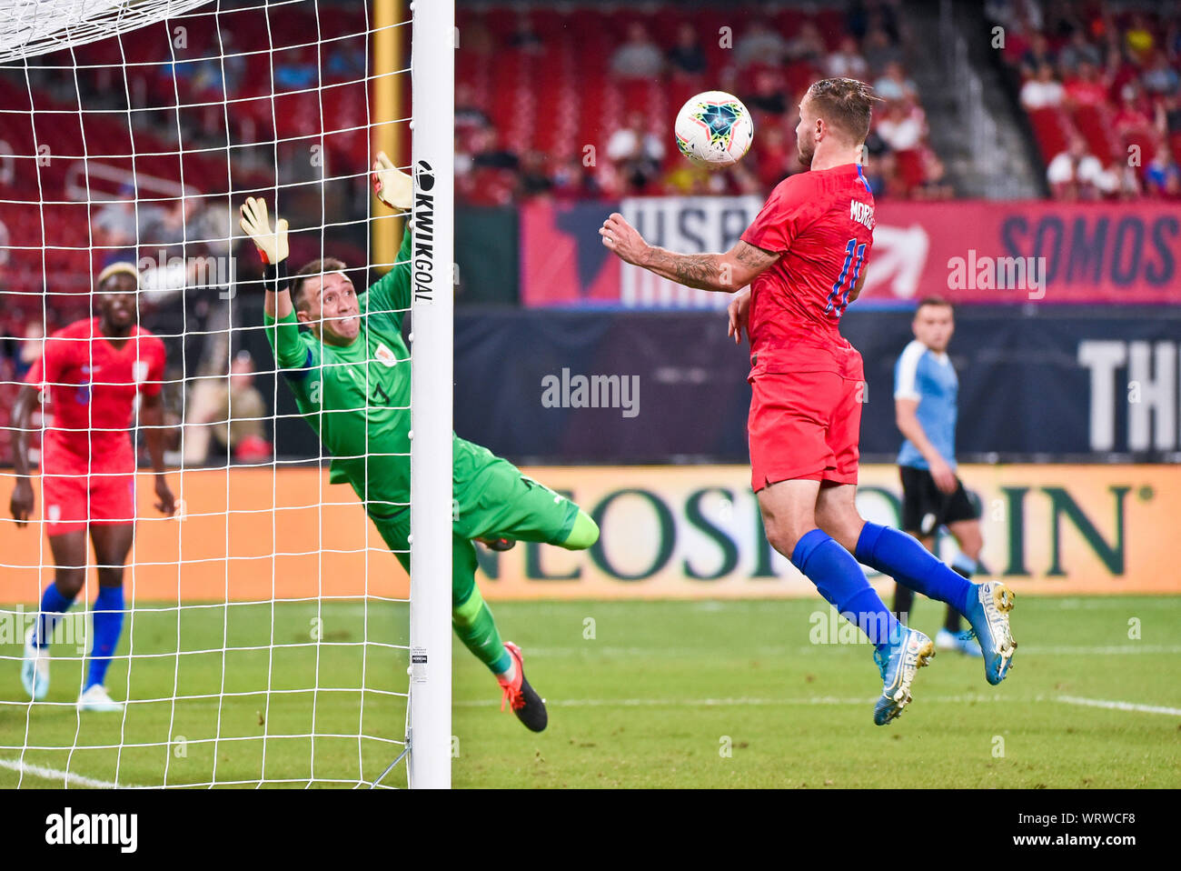 St. Louis, Missouri, USA. 10th Sep, 2019. US Men's National Team forward Jordan Morris (11) deflects the ball with his chest past Uruguay goalkeeper Fernando Muslera (1) for a goal to tie the game up at 1 to 1 during the final match before the Concacaf Nations League as the United States Men's National Team hosted Uruguay at Busch Stadium in St. Louis City, MO Ulreich/CSM/Alamy Live News Stock Photo