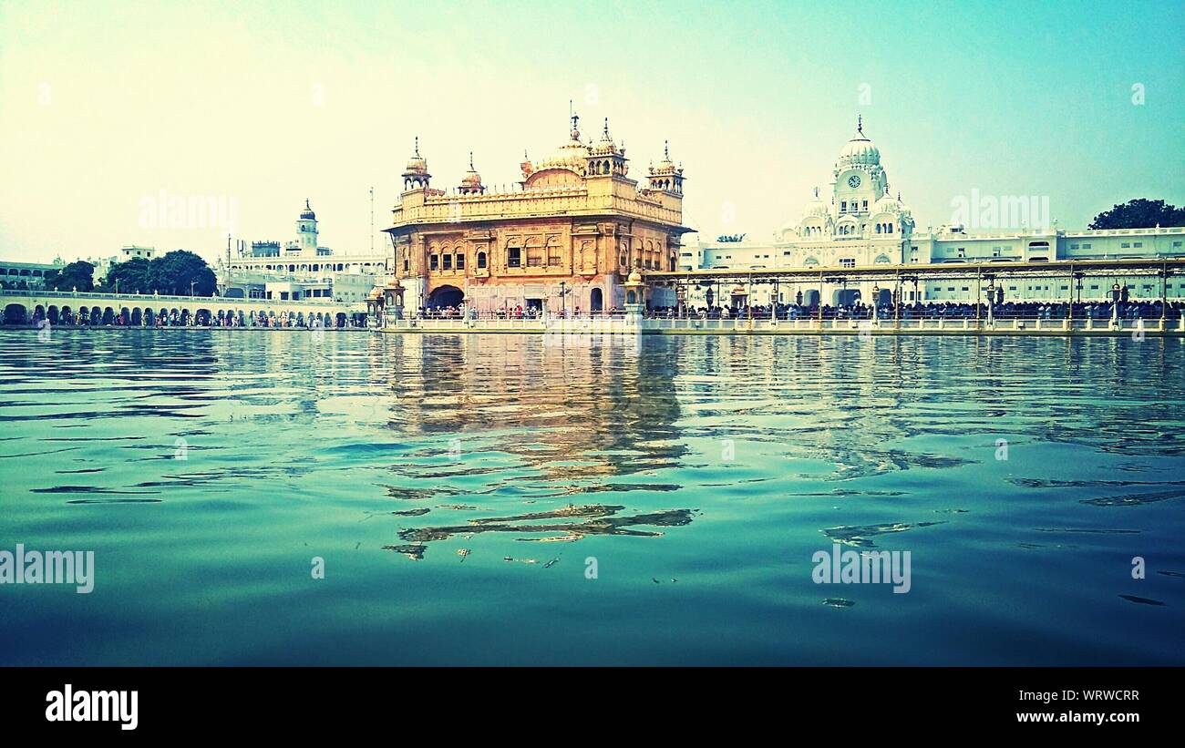 Harmandir Sahib Temple Reflection On Pond Against Clear Sky Stock Photo - Alamy Harmandir Sahib Temple Reflection On Pond Against Clear Sky Stock Photo - Alamy