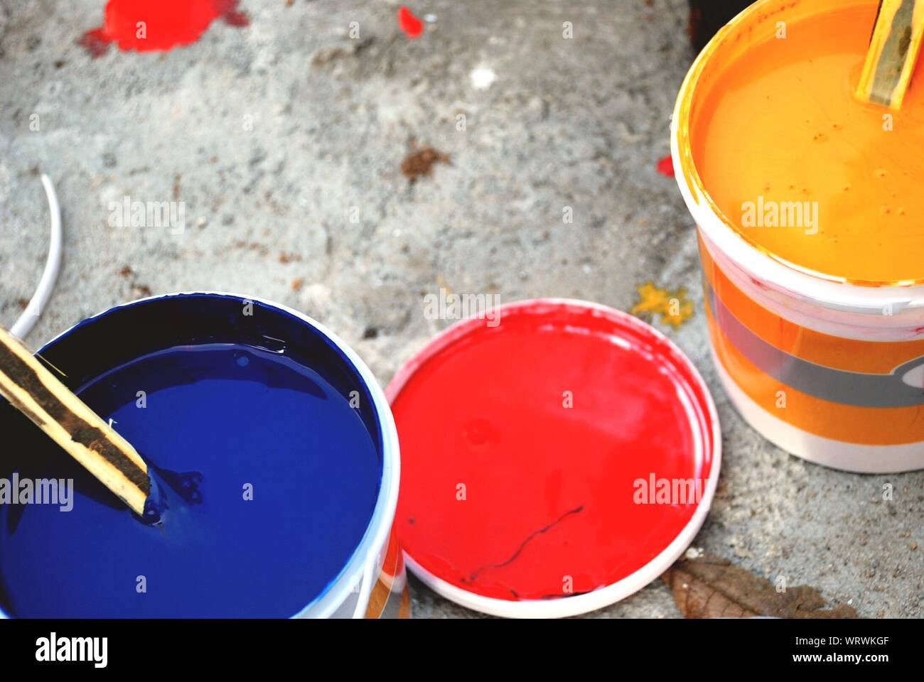 Download High Angle View Of Blue And Yellow Paint Cans Stock Photo Alamy PSD Mockup Templates