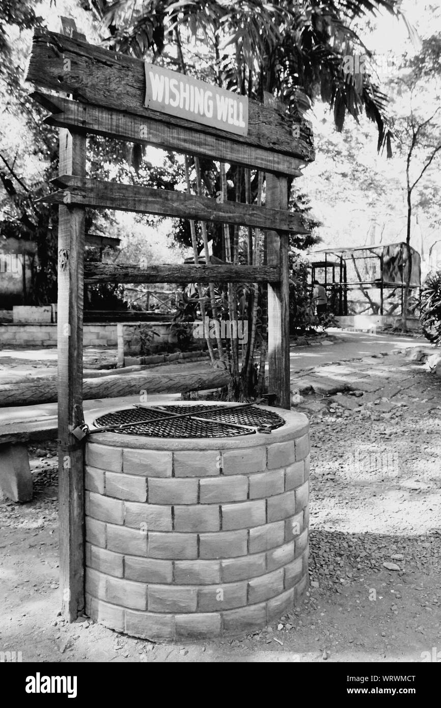 Wishing Well In Park Stock Photo