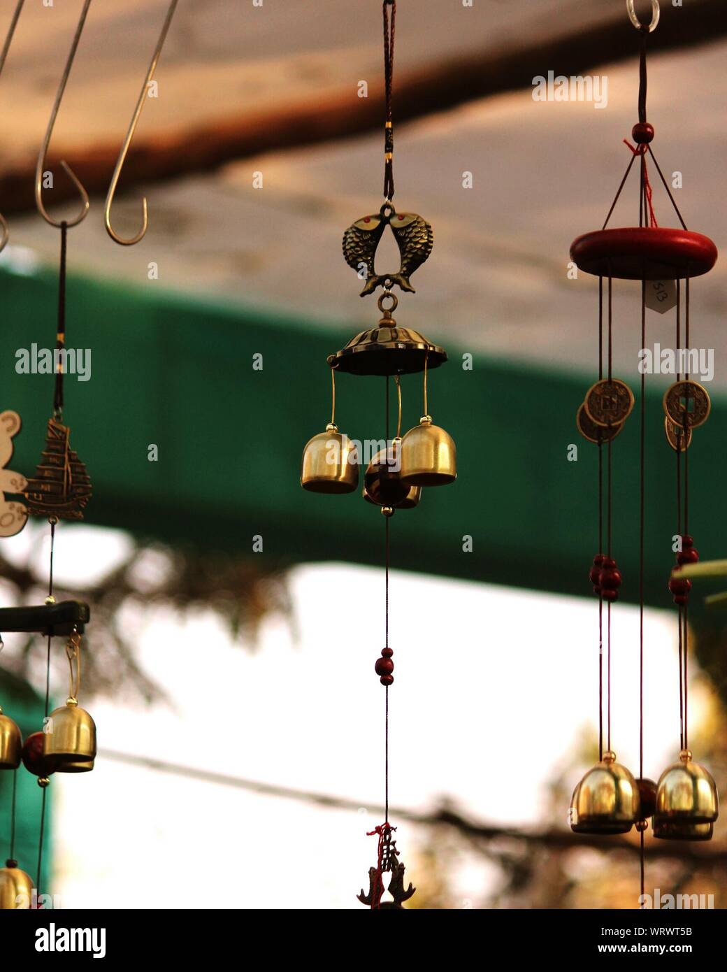 Close-up Of Wind Chimes Hanging In Store For Sale Stock Photo