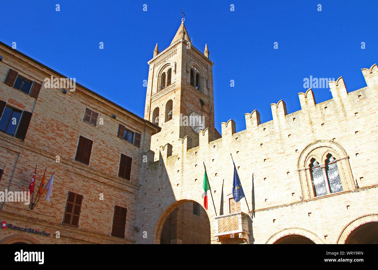 clock tower on the church in the Medieval village of Montecassiano  in the Marches or Le Marche region of central Italy near the town of Macerata Stock Photo