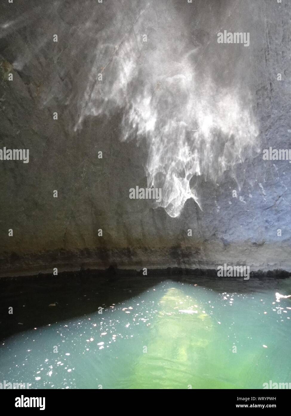 Sunlight Falling On Water In Well Stock Photo
