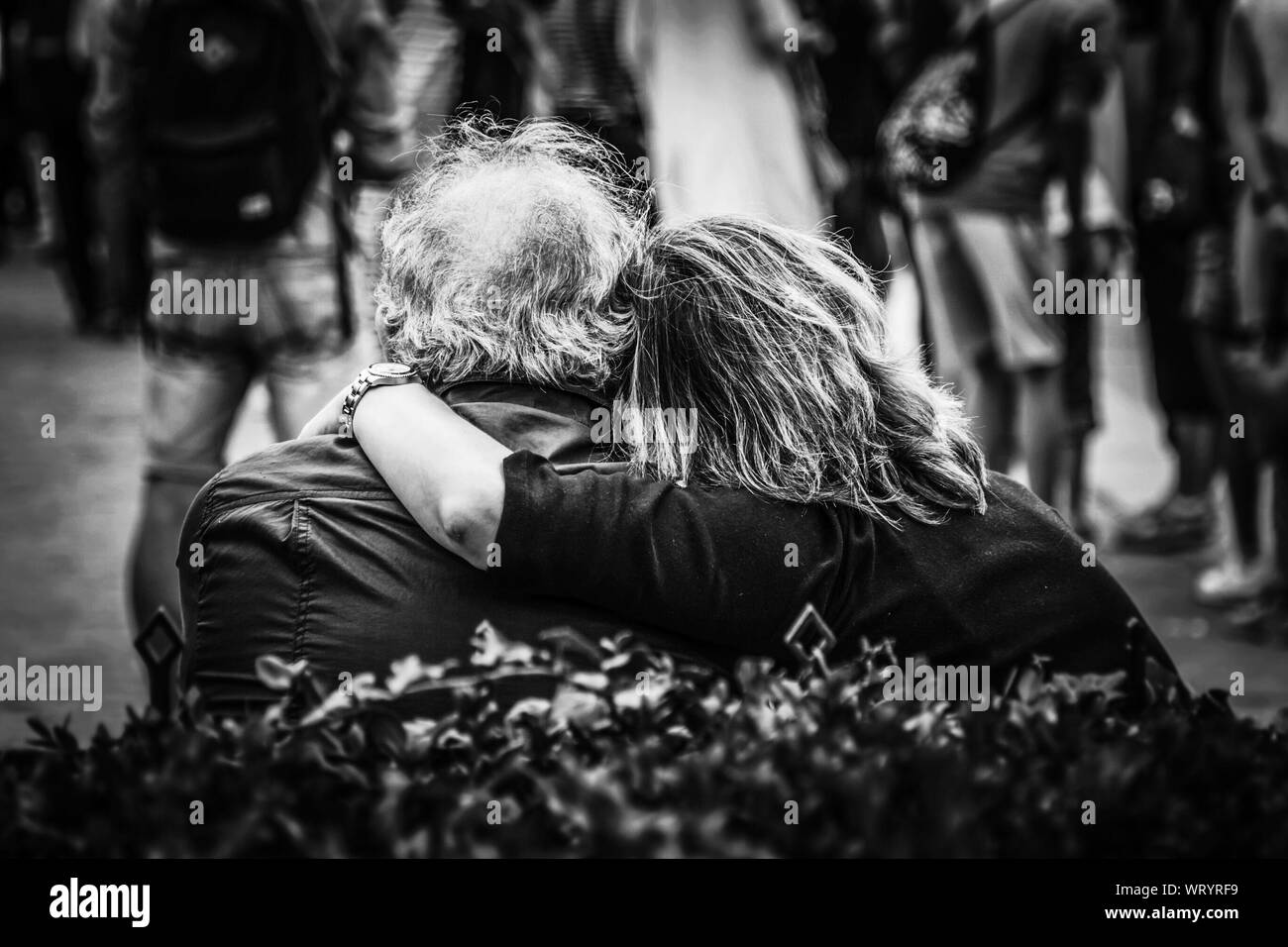 Woman arm around man hi-res stock photography and images - Alamy
