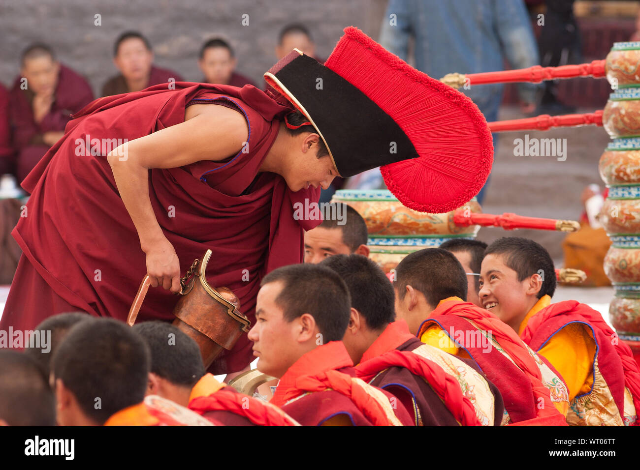 Tibetan Buddhist monks at Sakya monastery take a break from their