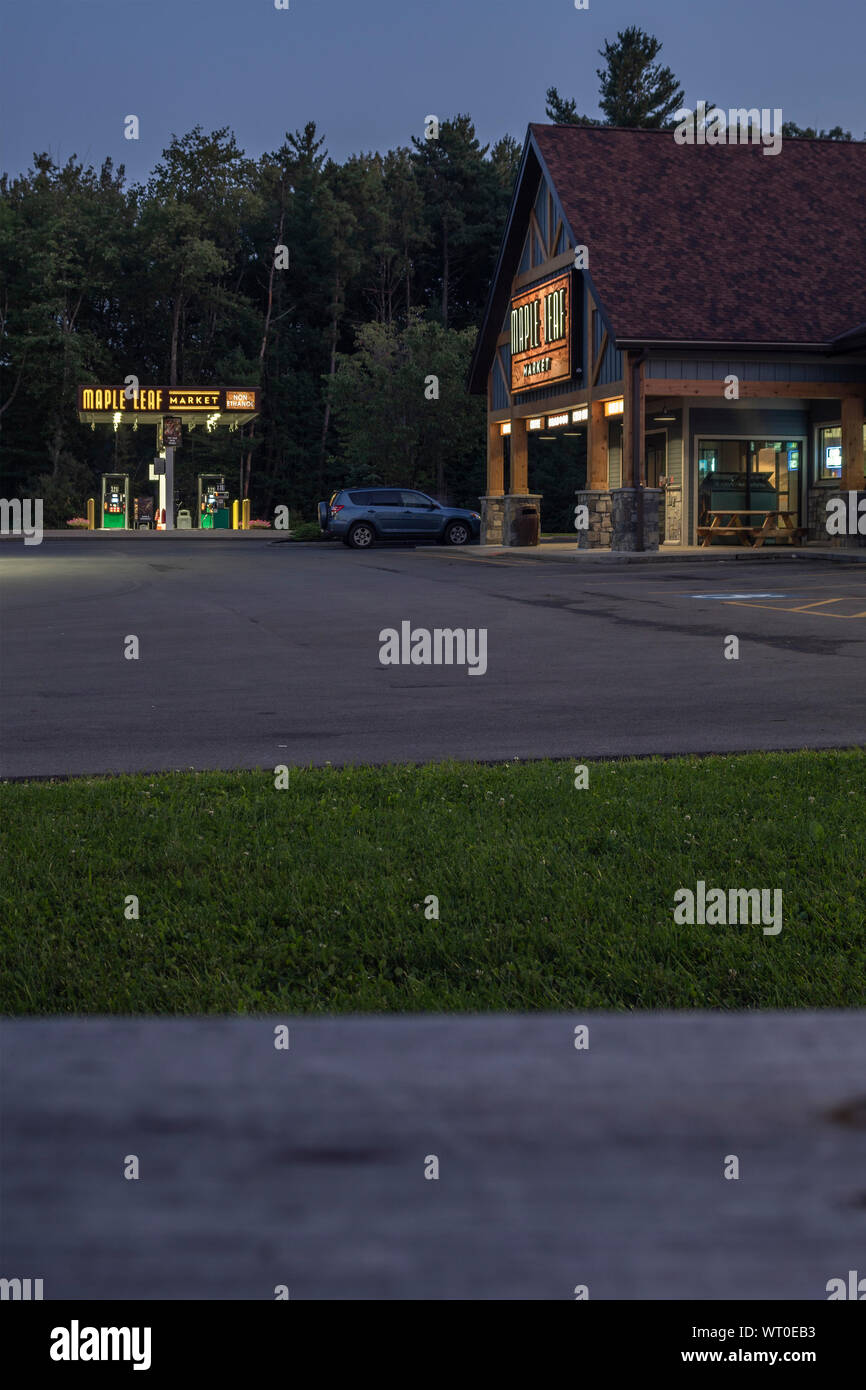VERONA BEACH, NEW YORK - SEPTEMBER 02, 2019: Night shot of Maple Leaf Market, a convenience store chain and gas station with all day food serving Grab Stock Photo