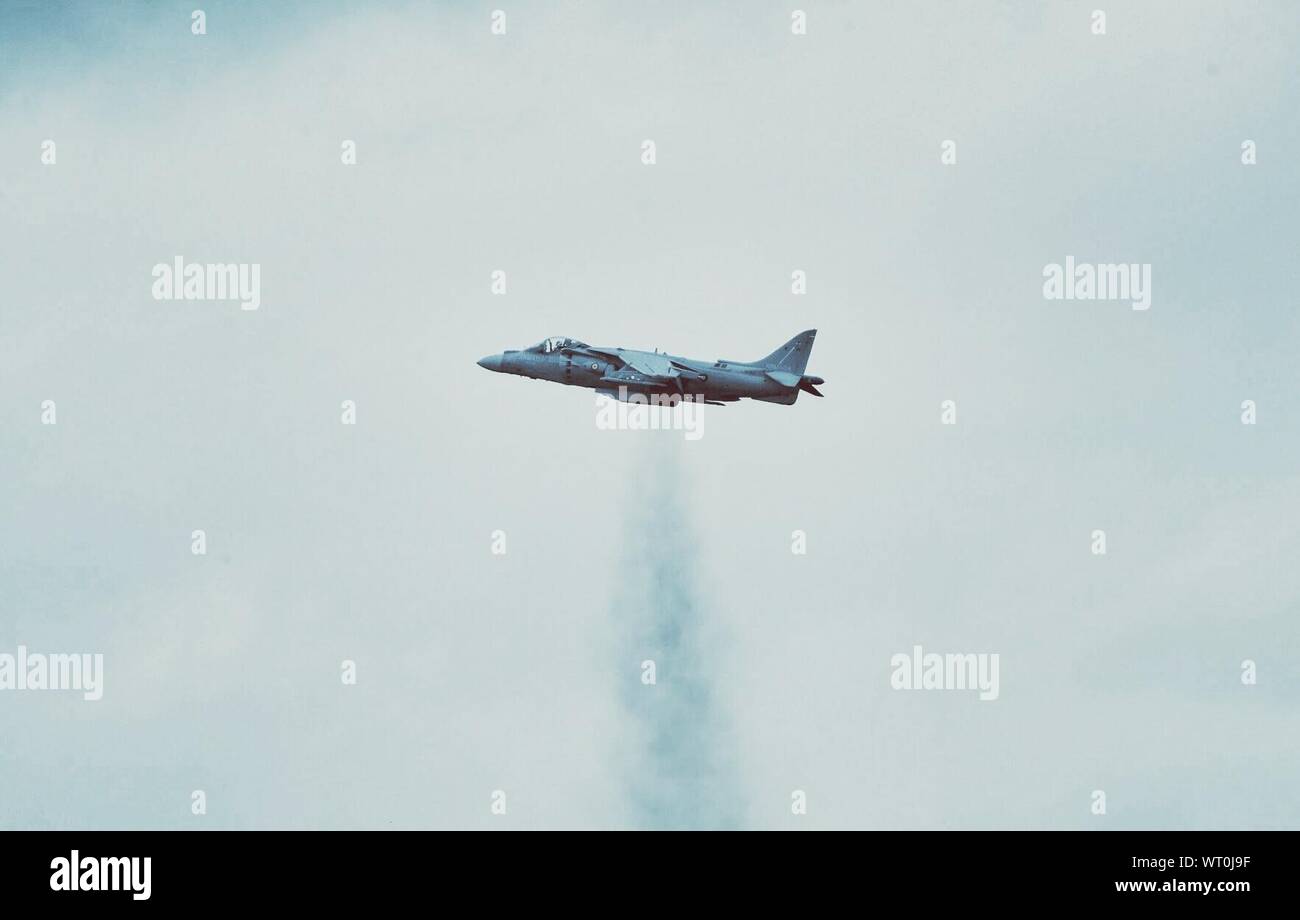 Military Airplane In Sky Stock Photo