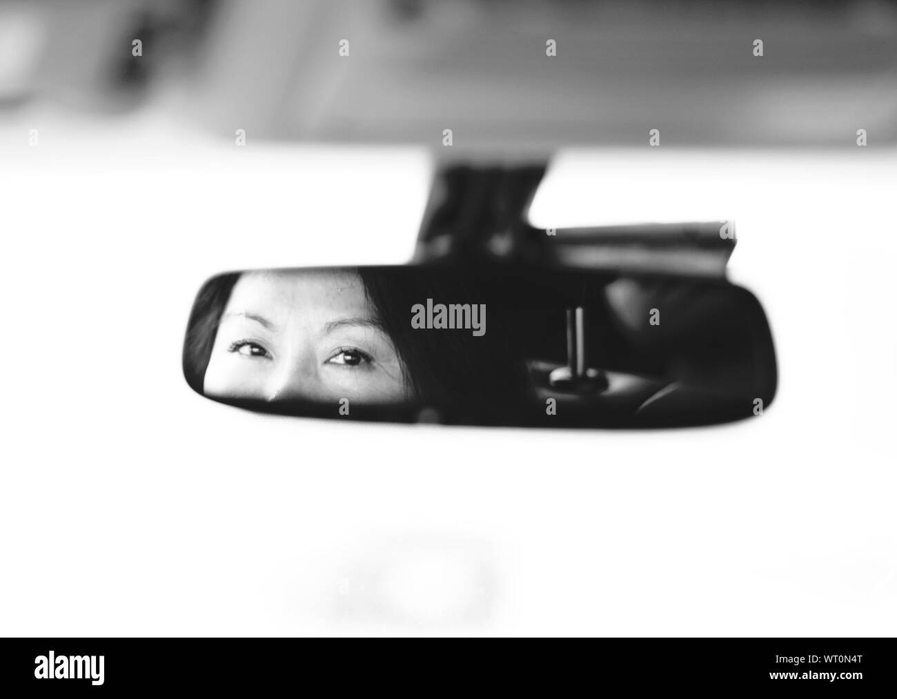 Woman rear view mirror Black and White Stock Photos & Images - Alamy