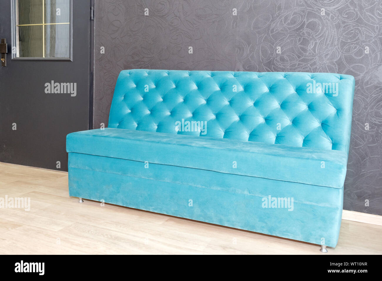 Luxury velour quilted sofa, home decor. Furniture design, classic