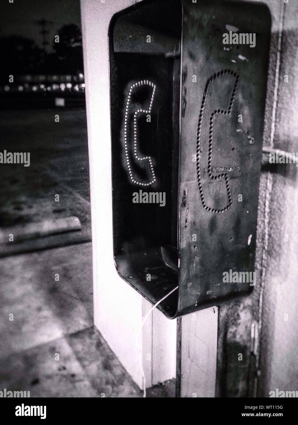 Old telephone mounted on wall hi-res stock photography and images - Alamy