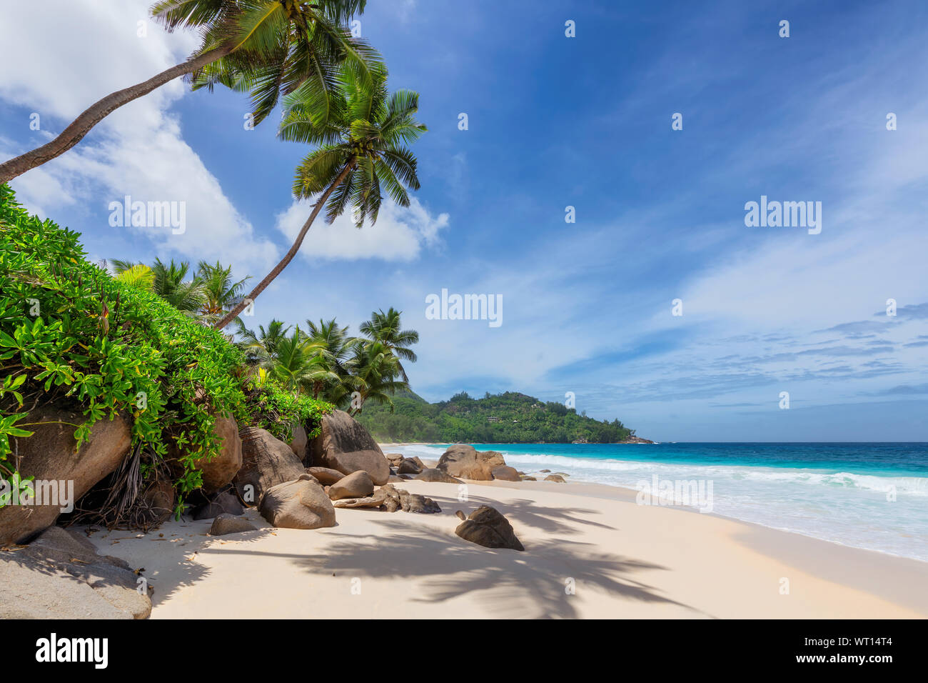 Exotic beach with white sand and tropical sea on Paradise island. Stock Photo