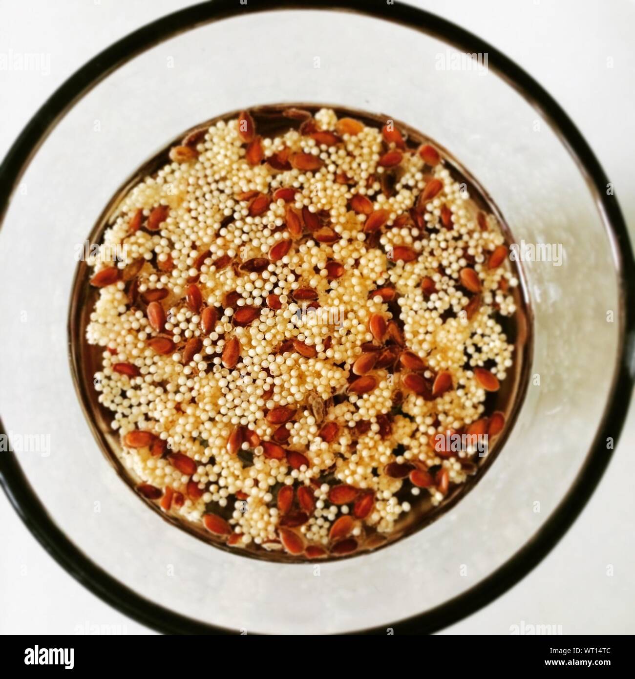 Directly Above Shot Of Amaranth And Flax Seeds In Bowl Stock Photo