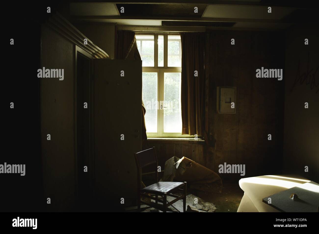 Empty Chair In Abandoned Room Stock Photo Alamy