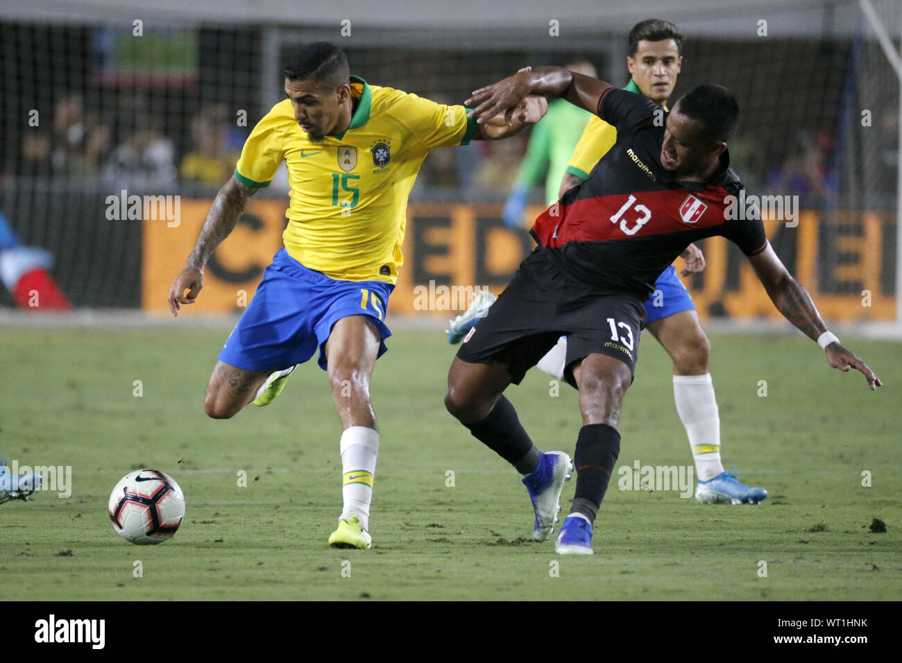 Los Angeles, California, USA. 10th Sep, 2019. Brazil midfielder Allan (15) and Peru midfielder Renato Tapia (13) vie for the ball during an International Friendly Soccer match between Brazil and Peru at the Los Angeles Memorial Coliseum in Los Angeles on Tuesday, September 10, 2019. Credit: Ringo Chiu/ZUMA Wire/Alamy Live News Stock Photo
