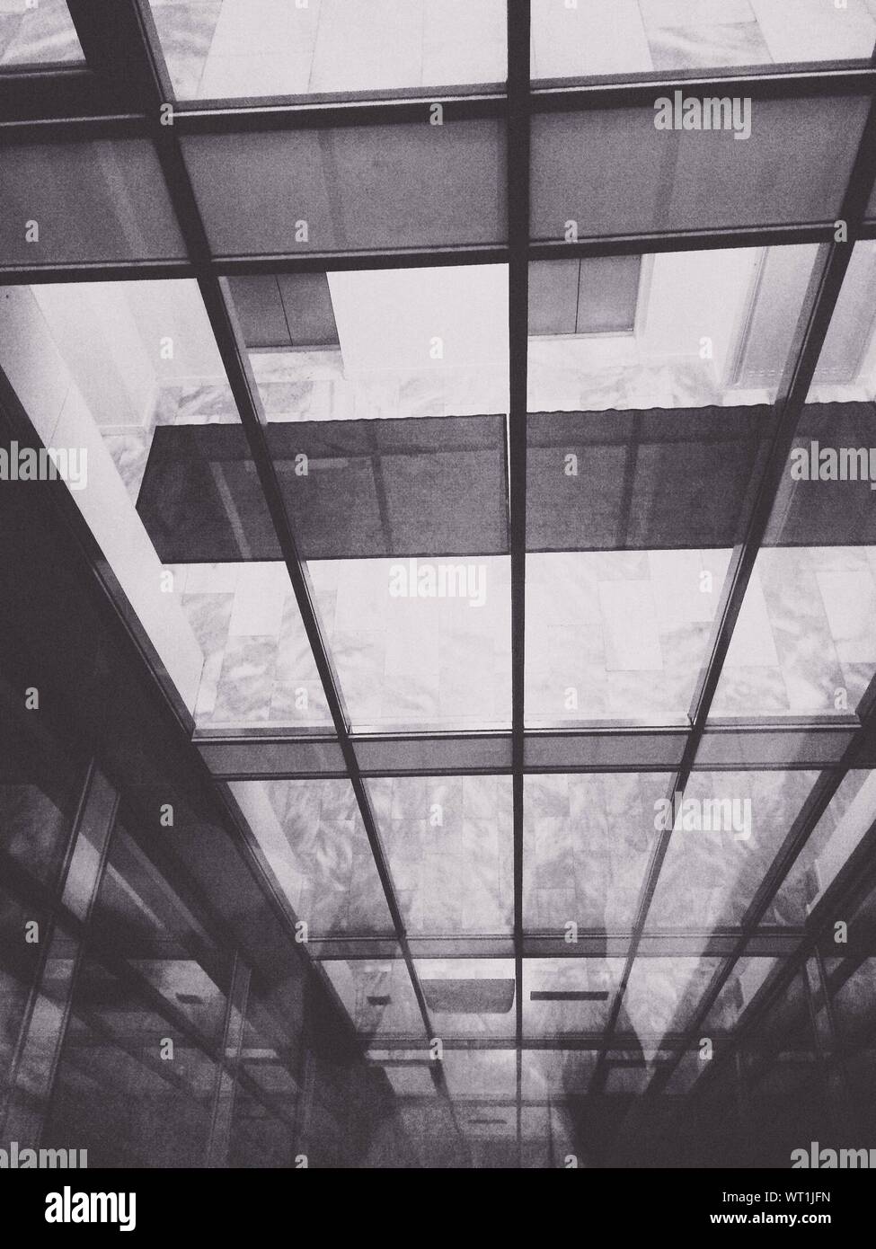 Elevator Seen Through Glass Building Stock Photo - Alamy