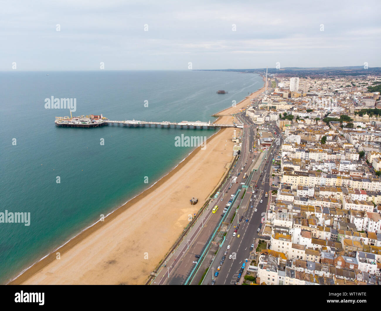 Aerial Photo Of The Famous Brighton Pier And Ocean Located In The South 