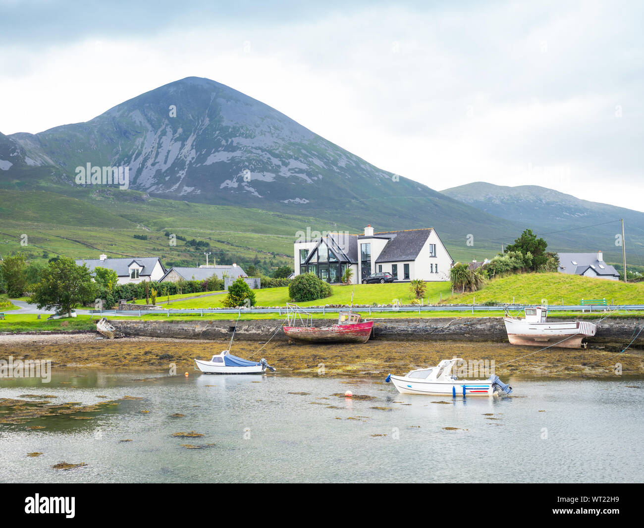 A small fishing harbour in Clew Bay, near Westport in County Mayo, Ireland. Stock Photo