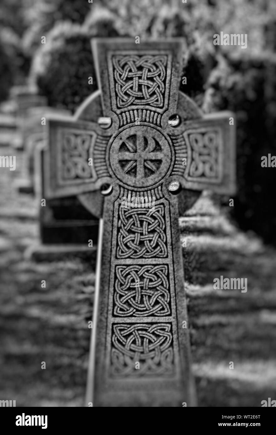 Close-up Of Celtic Cross At Cemetery Stock Photo