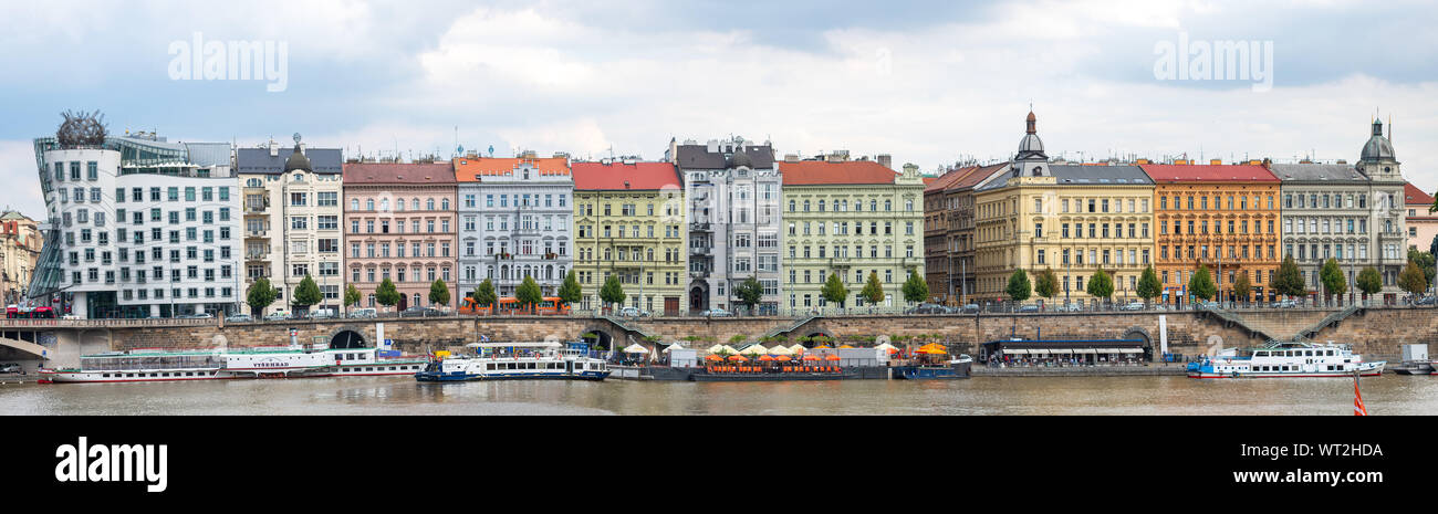 Prague palaces with the dancing house or Fred and Ginger on the Vltava river Stock Photo