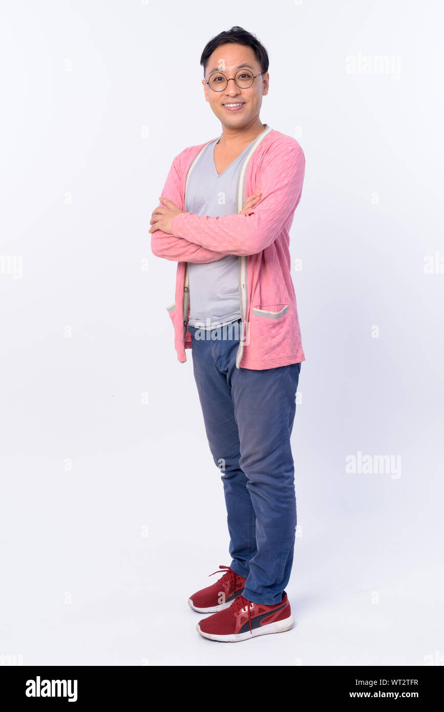 Full body shot of happy Japanese man smiling with arms crossed Stock ...