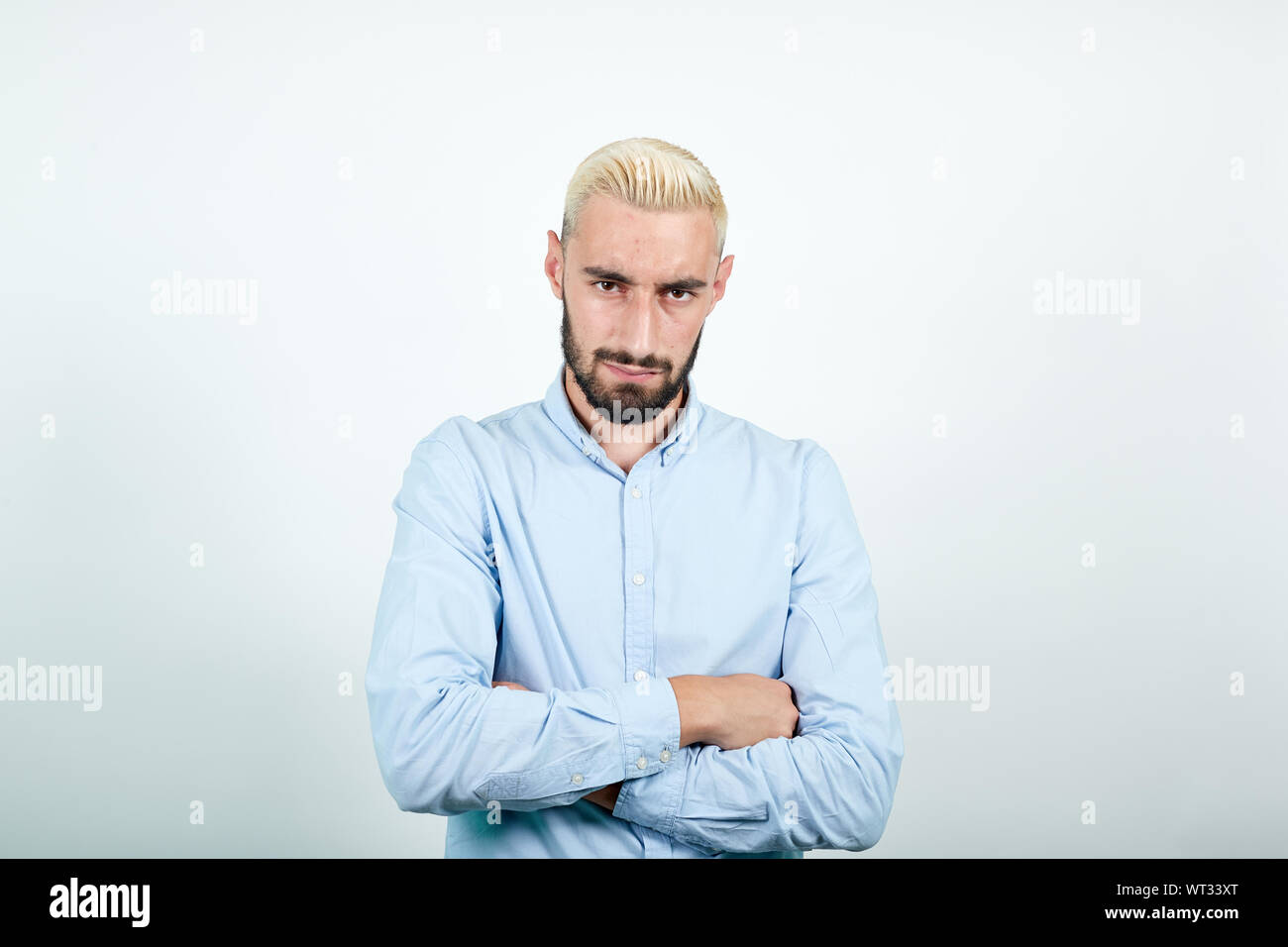 Man With Blond Hair Black Beard Over Isolated White Background