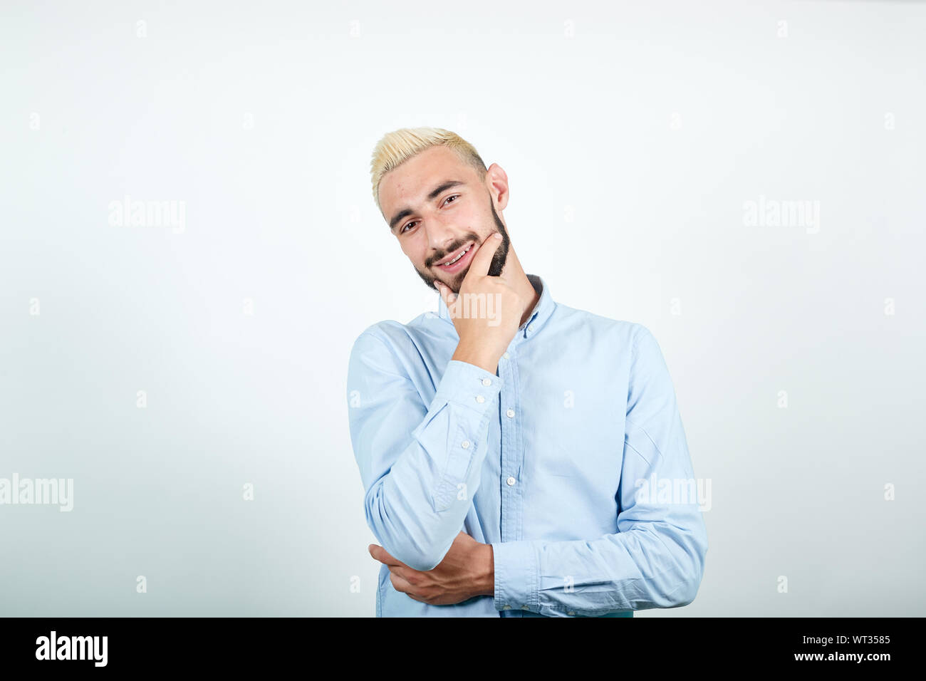 Man With Blond Hair Black Beard Over Isolated White Background
