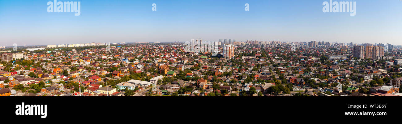 Aerial view of the city. Summer day. Residences and skyscrapers ...