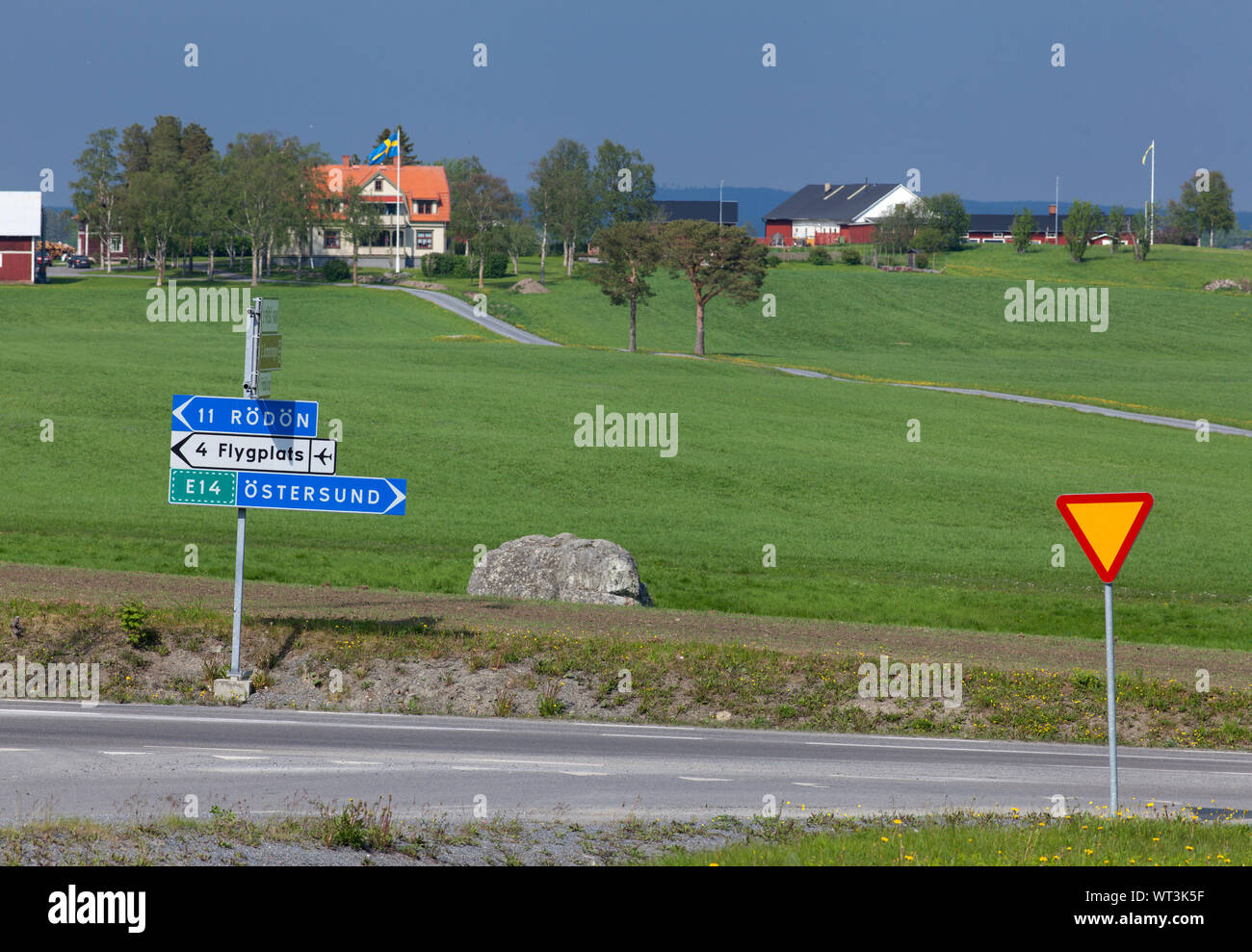 FRÖSÖN, SWEDEN ON JUNE 06, 2019. View of meadows, hills and a farm in ...