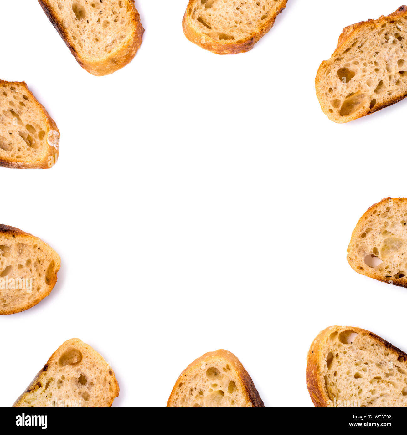 Frame of pieces of white bread isolated on white background. Stock Photo