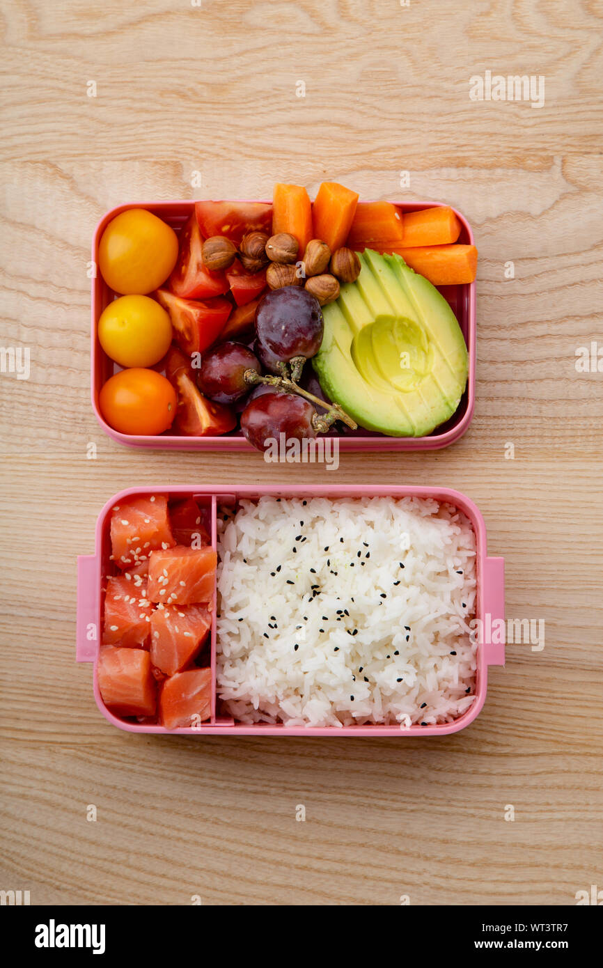 Creative layout with healthy lunch dishes variety in bento boxes on ...