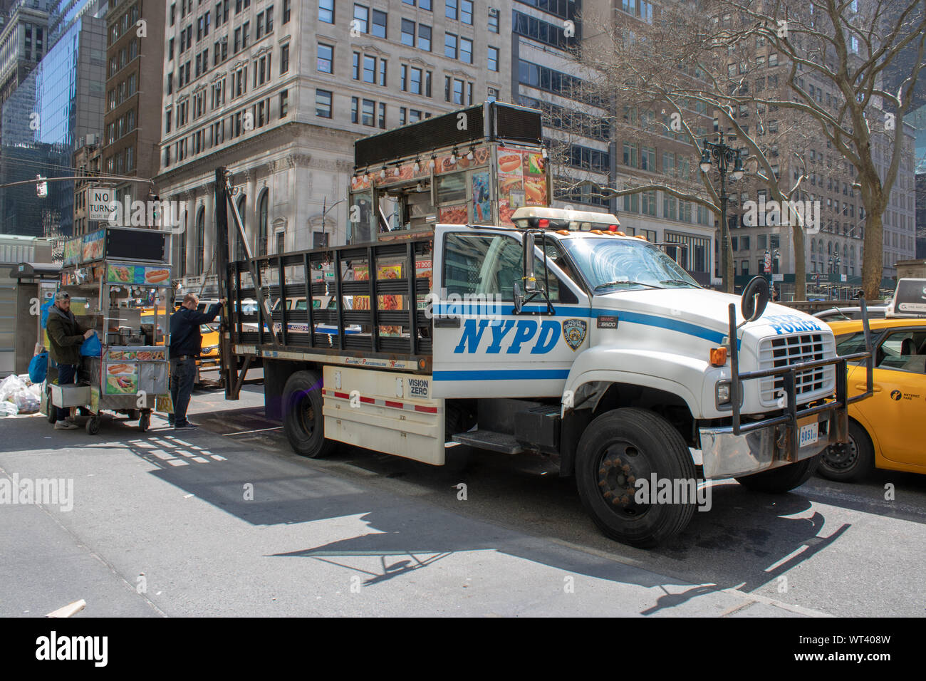 New York USA, 8th April 2019: A United States of America police truck taking away a street venders equipment in Manhattan Stock Photo