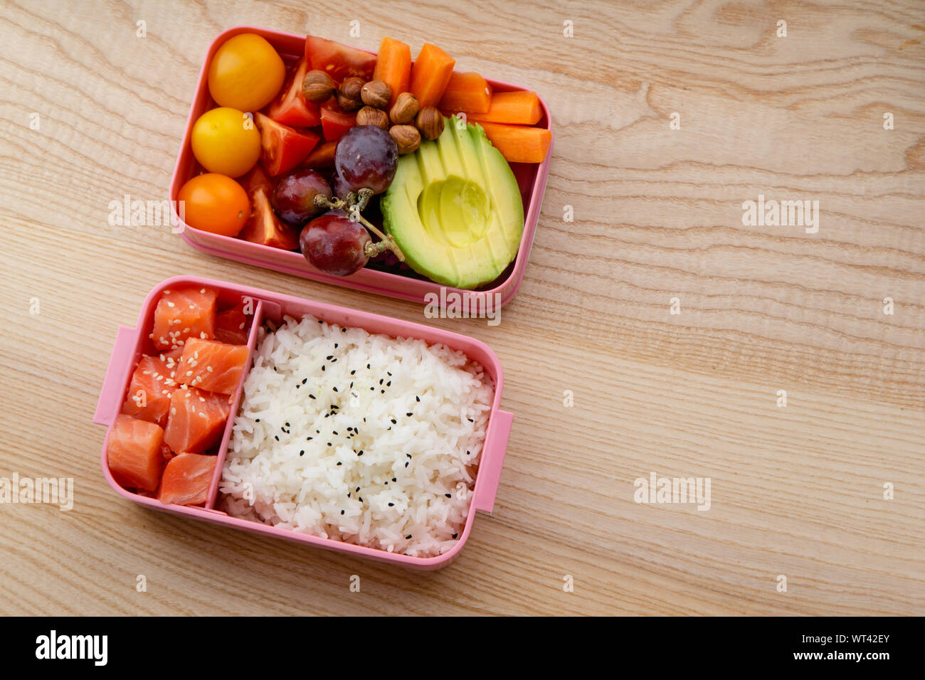 Creative layout with healthy lunch dishes variety in bento boxes on ...