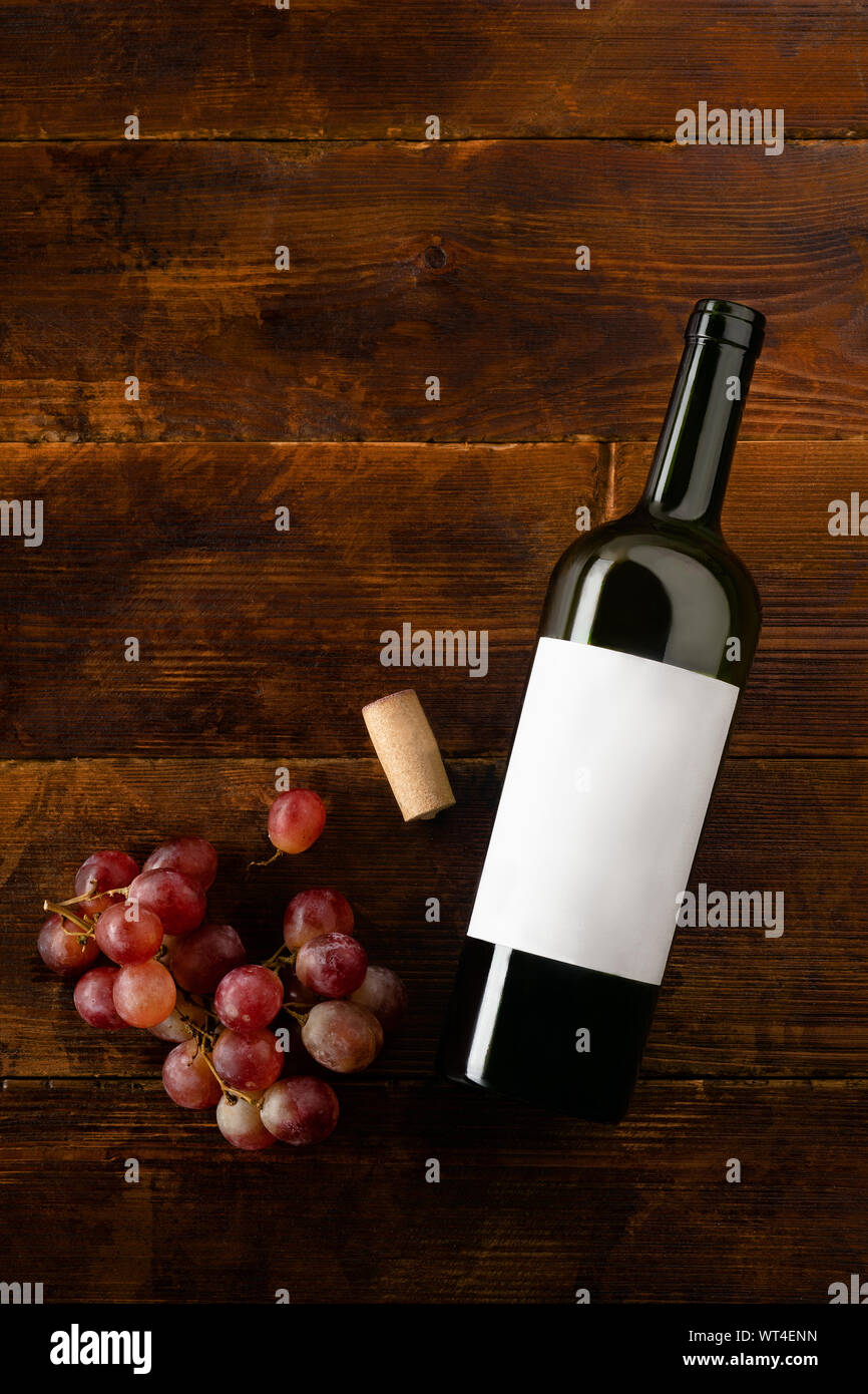 Download Flat Lay Mockup With Wine Bottle Cork And Red Grape From Above Image Vertical Composition Stock Photo Alamy