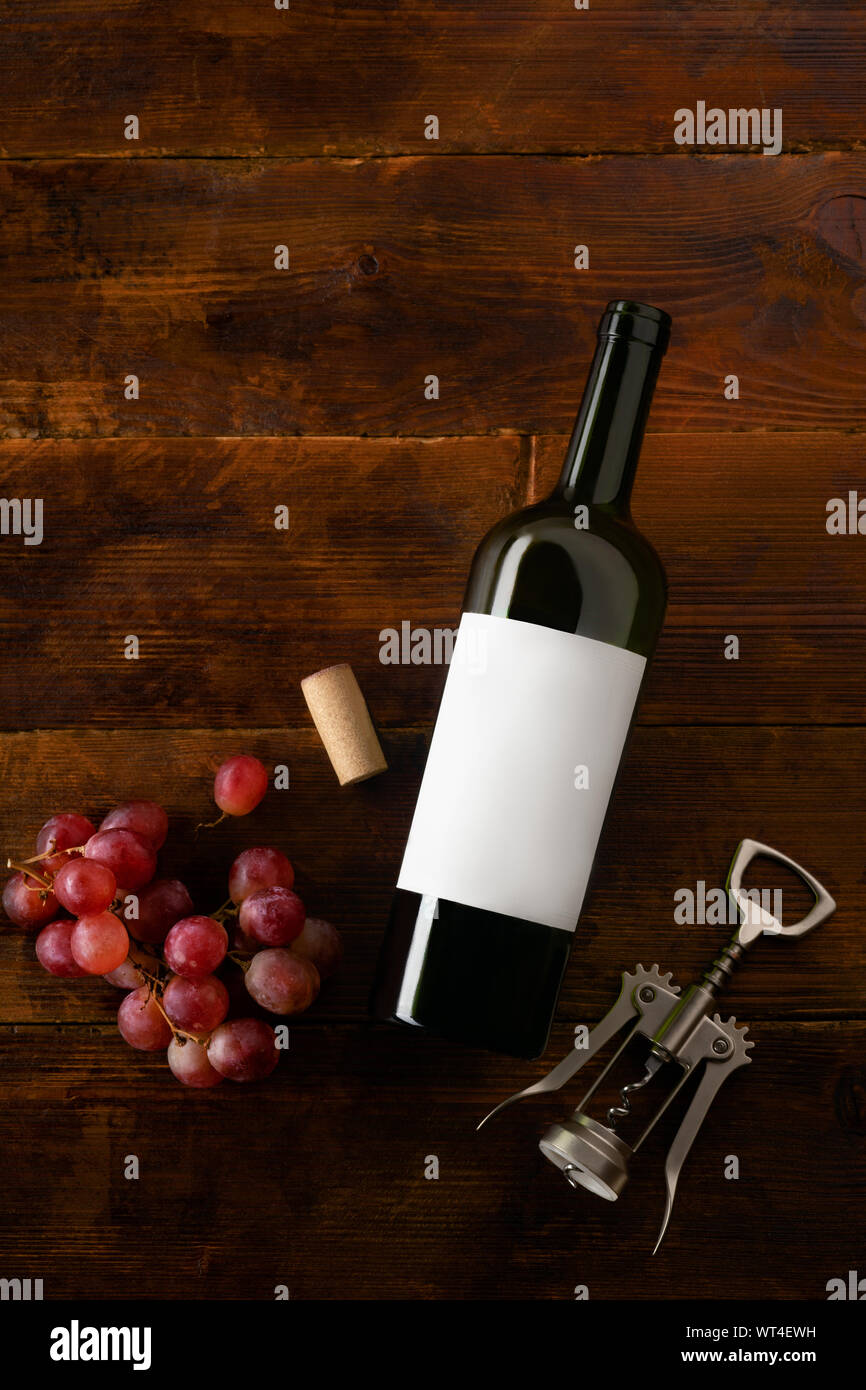 Download Flat Lay Mockup With Wine Bottle Cork Corkscrew And Red Grape Vertical Composition Taken From Above Stock Photo Alamy
