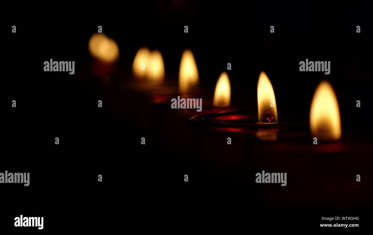 Oil Lamps Burning In Row Stock Photo Alamy