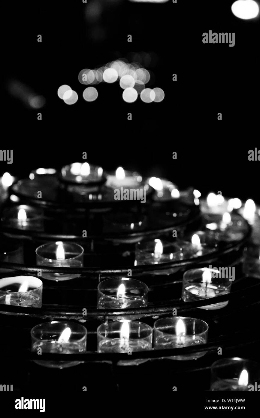 Lit Candles At Night Stock Photo Alamy