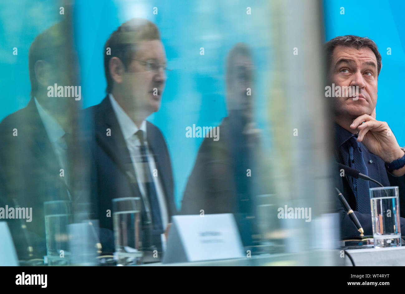 Munich, Germany. 11th Sep, 2019. Hans Reichhart (l, CSU), State Minister for Housing, Construction and Transport, and Markus Söder (r, CSU), Prime Minister of Bavaria, will attend a press conference at the State Chancellery after the top meeting on housing policy. The topics were the creation of new living space in the conurbations, climate-friendly building and the affordability of living. Credit: Peter Kneffel/dpa/Alamy Live News Stock Photo