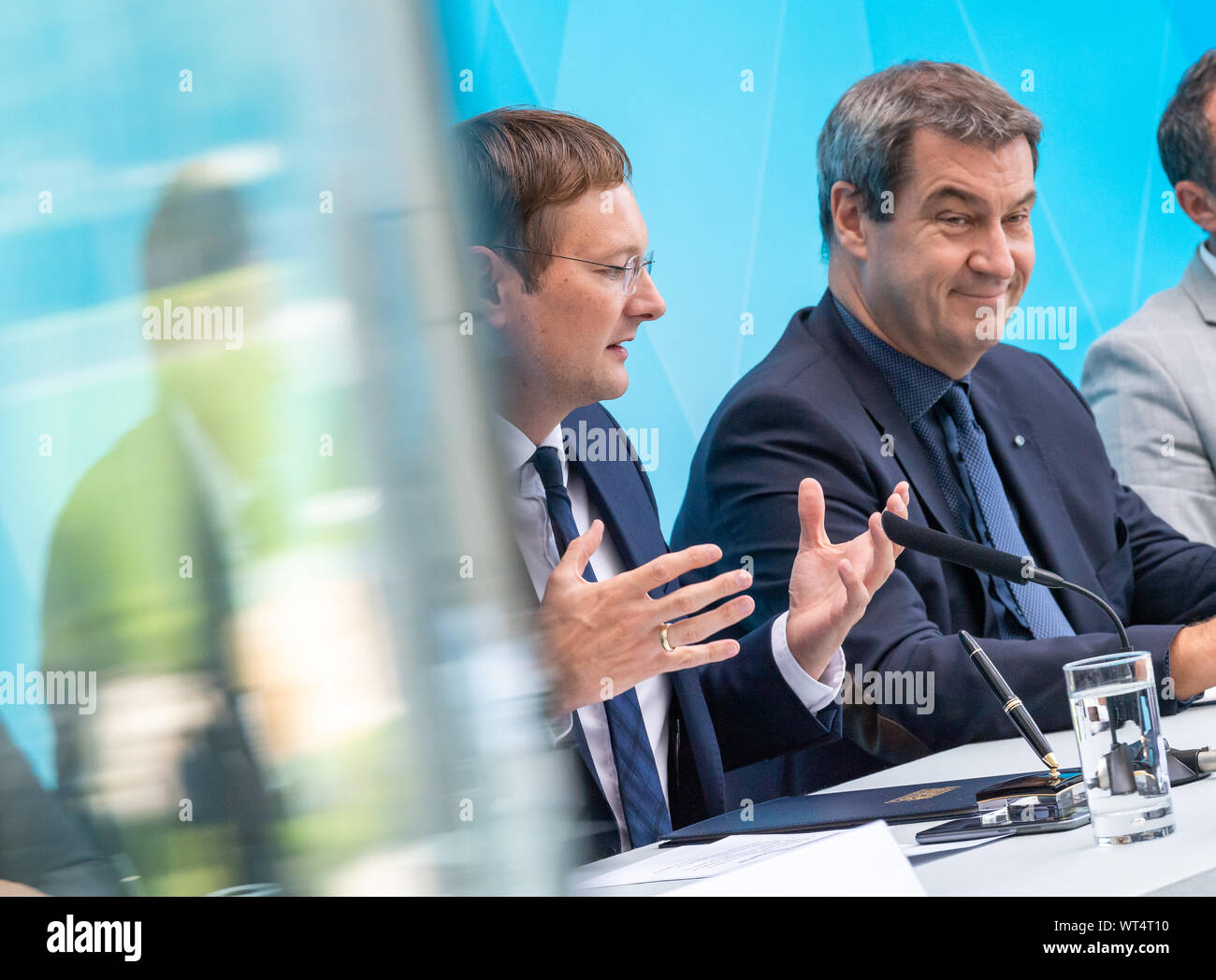 Munich, Germany. 11th Sep, 2019. Hans Reichhart (l, CSU), State Minister for Housing, Construction and Transport, and Markus Söder (r, CSU), Prime Minister of Bavaria, will attend a press conference at the State Chancellery after the top meeting on housing policy. The topics were the creation of new living space in the conurbations, climate-friendly building and the affordability of living. Credit: Peter Kneffel/dpa/Alamy Live News Stock Photo