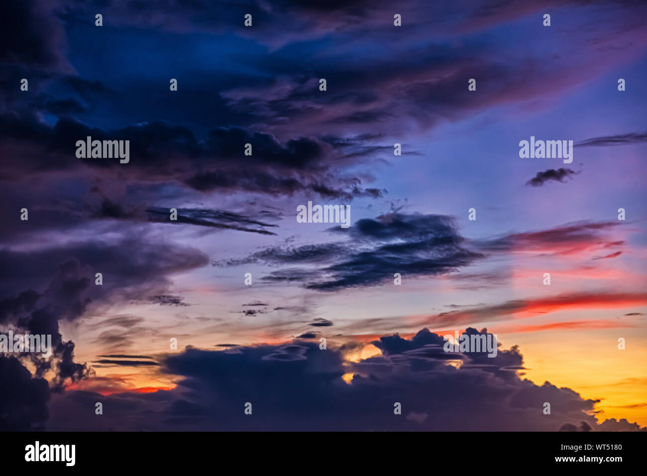 Beautiful evening sky with clouds, sunset, abstract blurred background. Stock Photo