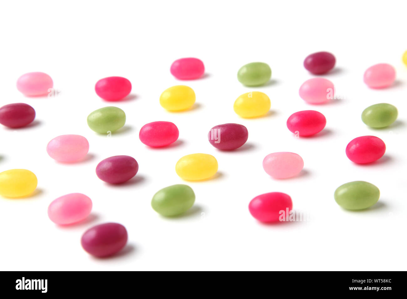 colorful candies jelly beans spread isolated on white background Stock ...