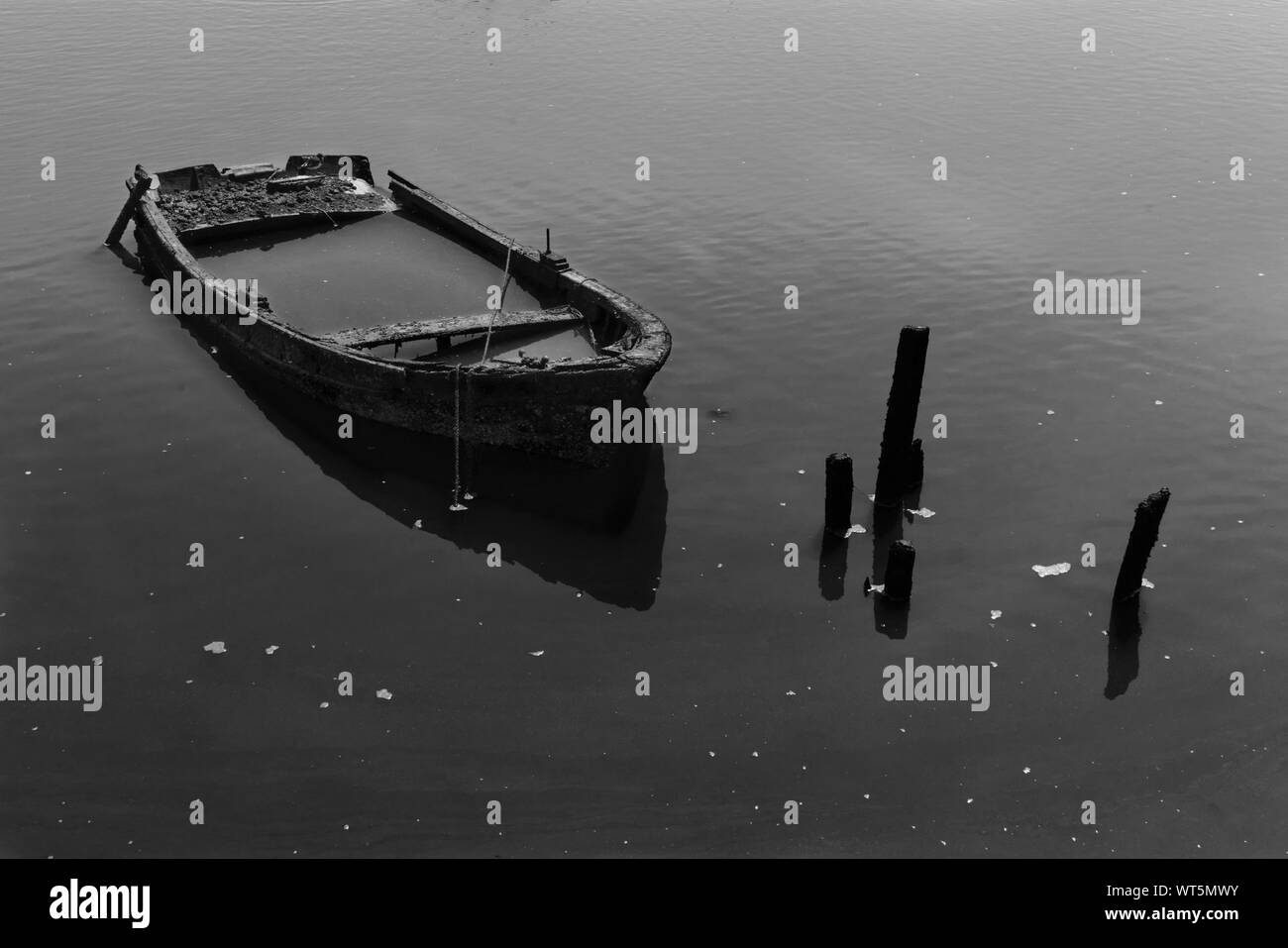 Sinking boat Black and White Stock Photos & Images - Alamy