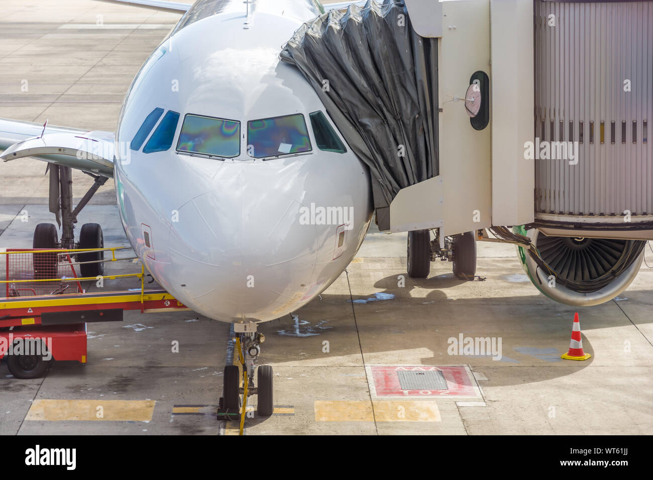 Airplane at the airport with gangway Stock Photo