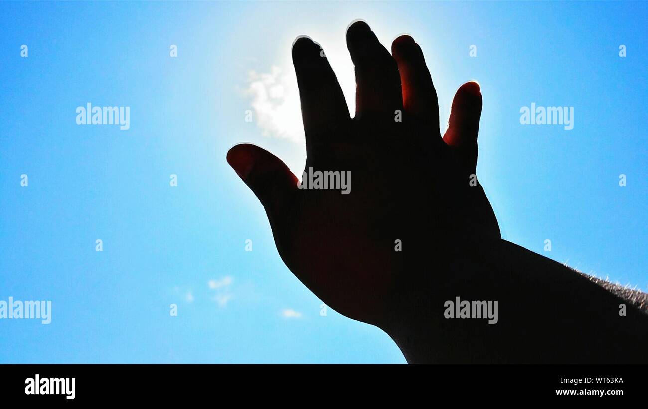 Man Hand Reaching Towards Sky Stock Photo Alamy