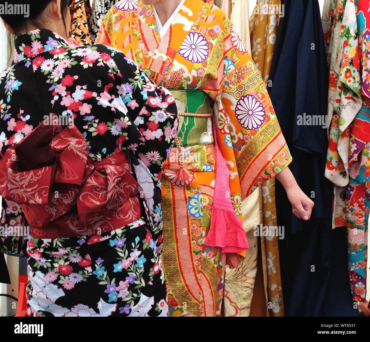 Japanese Women Trying On Kimono Stock Photo