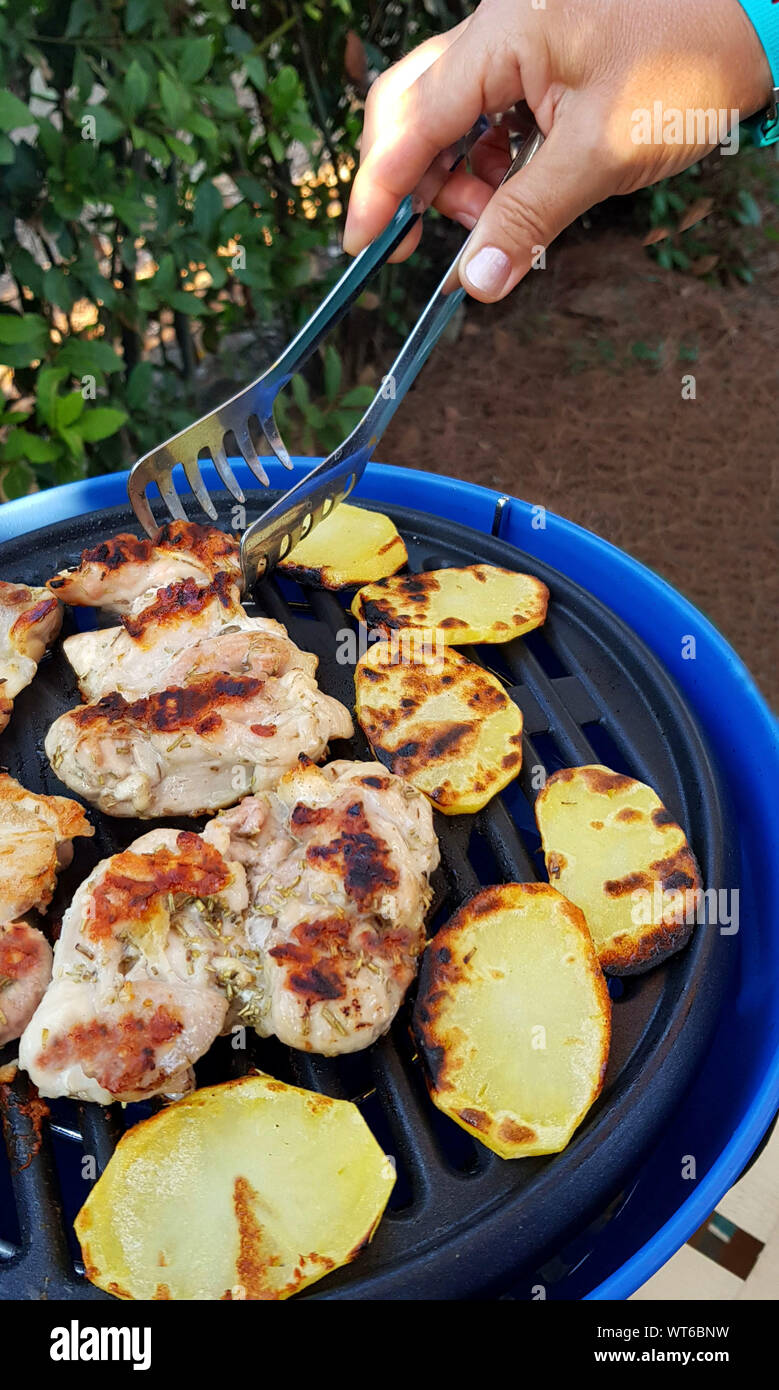 Easy campsite meals grill meat with outdoor camping grill portable