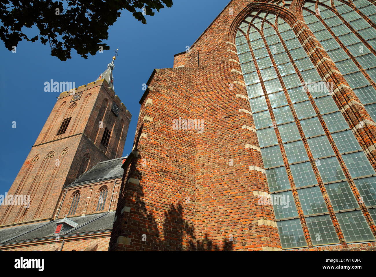 The Grote Kerk church, with stained glasses on the right, Naarden, Netherlands Stock Photo