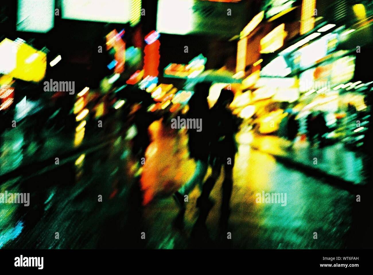 Side View Of Blurred People Walking On Road Stock Photo - Alamy