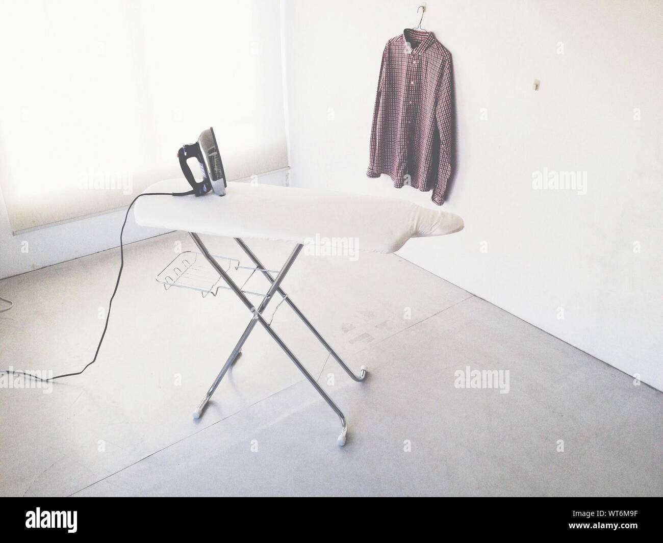 Iron And Ironing Board Stock Photo Alamy